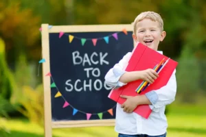 Happy child going back to school with confidence 2025